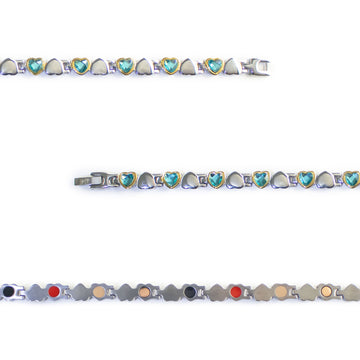 Close-up of Cherish bracelet showing gold-plated settings with blue Swarovski crystal heart links.